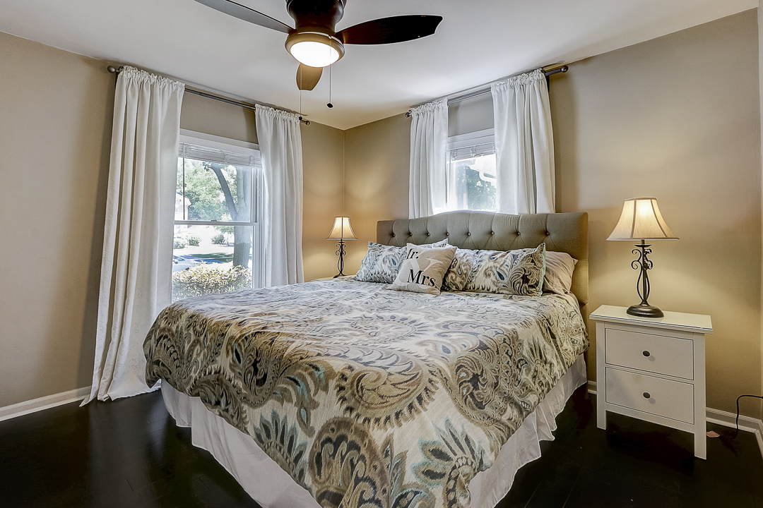 1025 North Main Street Naperville, IL 60563 - Photo 9 of 28 a bedroom with a large bed and a window
