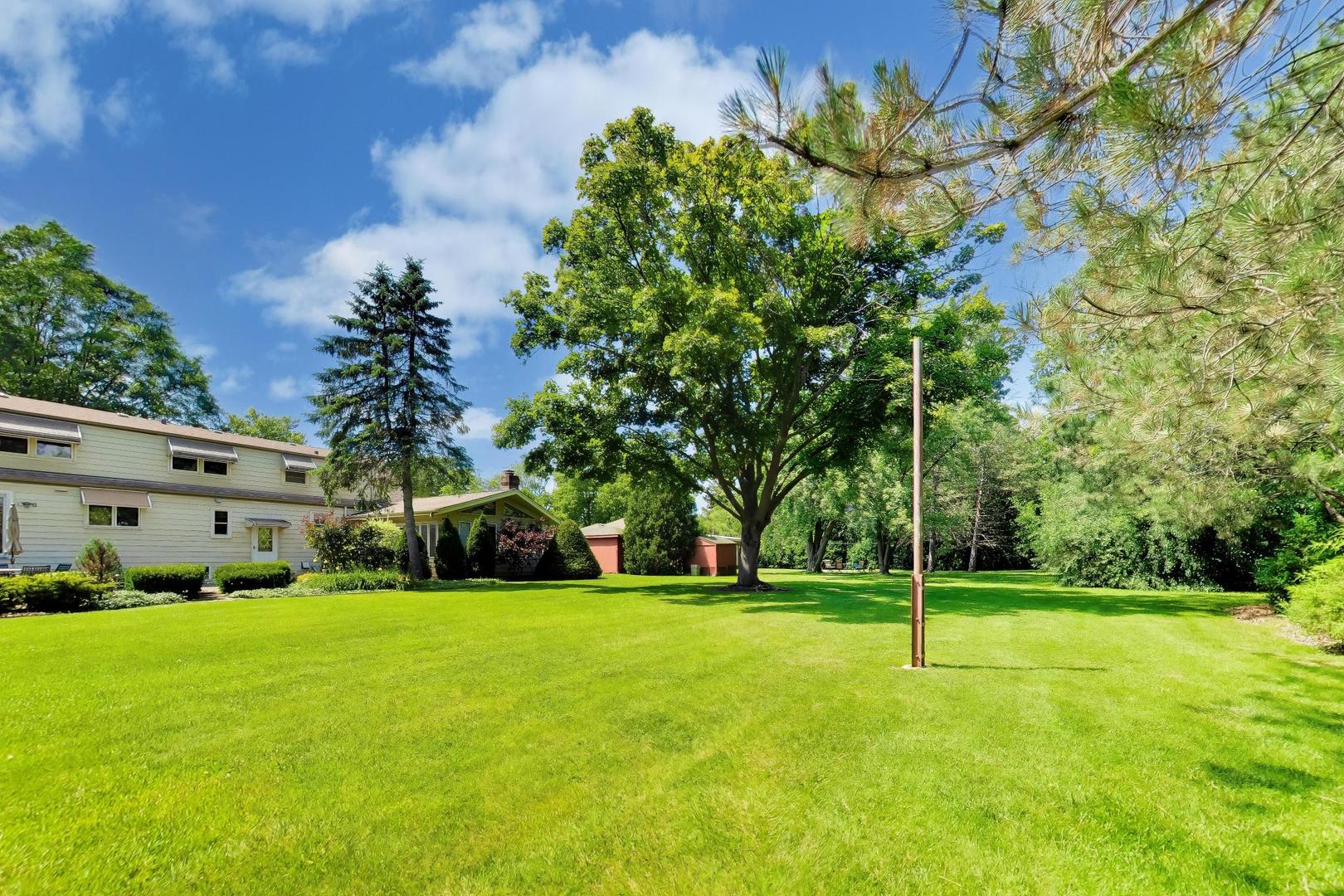 103 Cottonwood Road Northbrook, IL 60062 - Photo 45 of 50 a view of a tree in front of a house