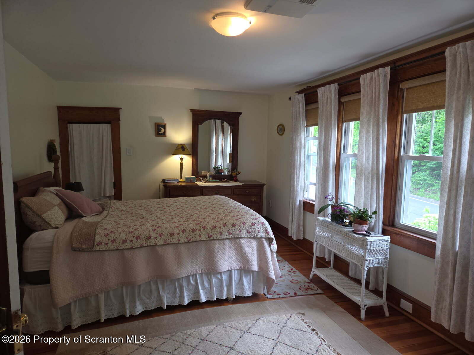 229 East Mountain Road Scranton, PA 18505 - Photo 28 of 47 a bedroom with a bed and large windows