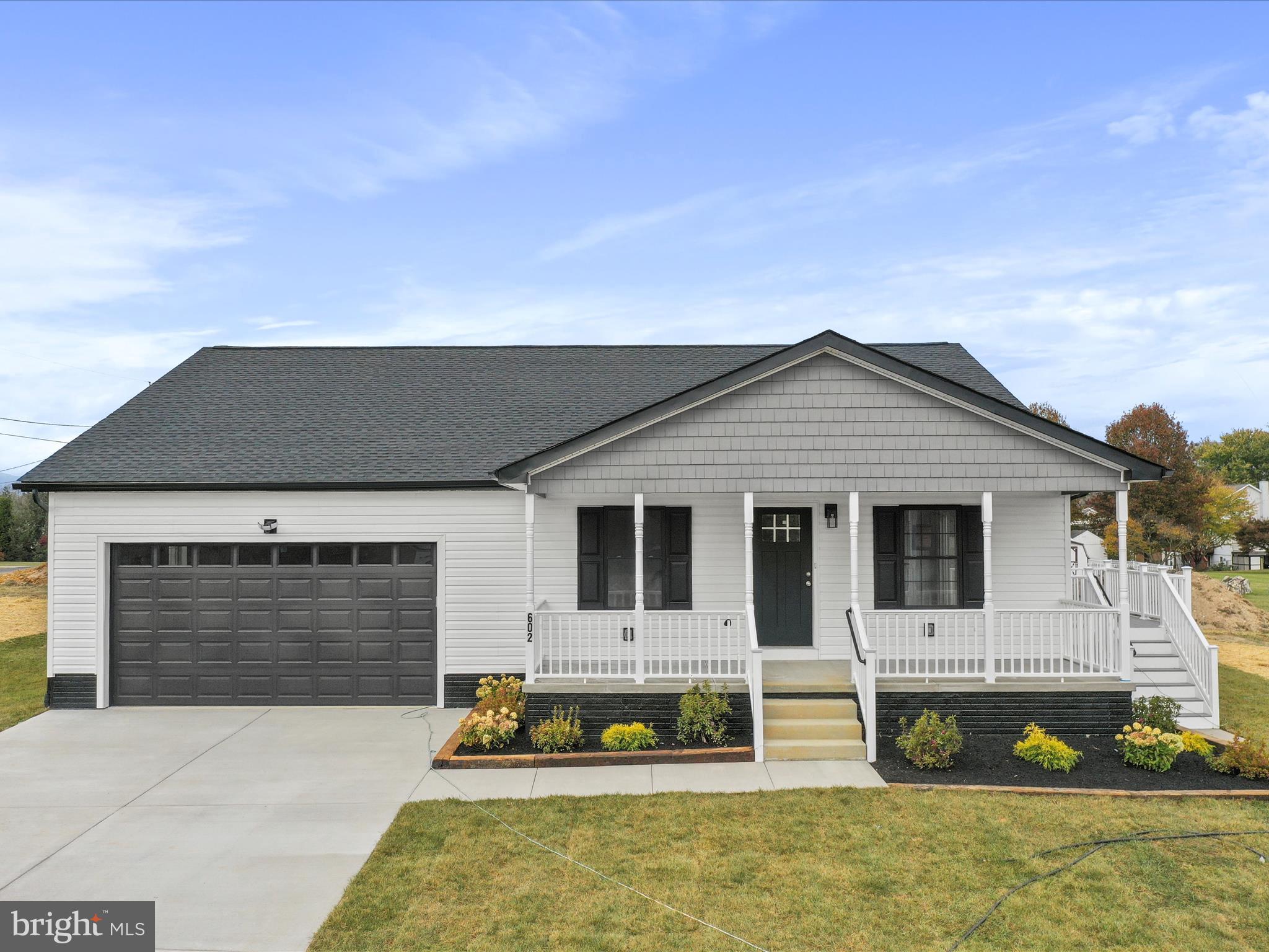a house view with a garden space