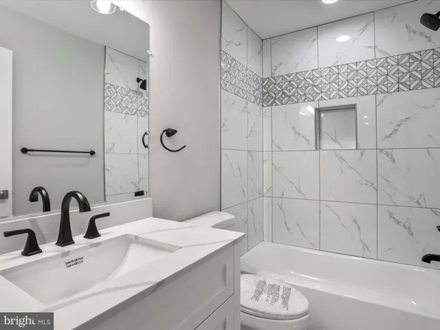 a bathroom with a sink and a bathtub