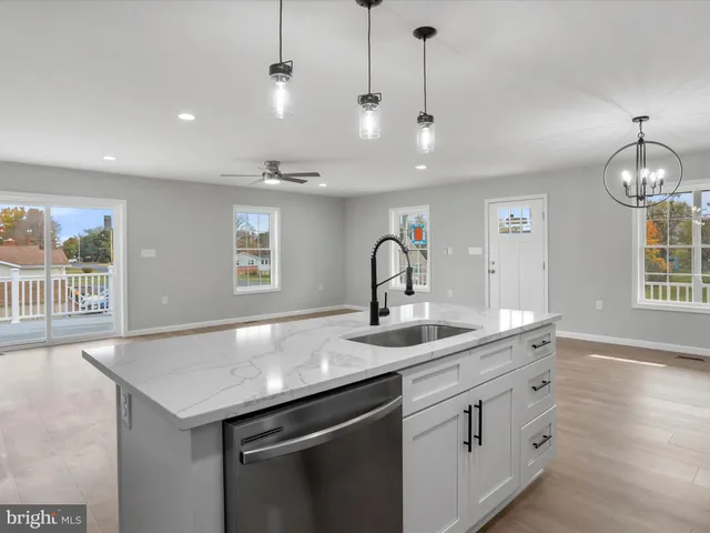 a kitchen with sink and window