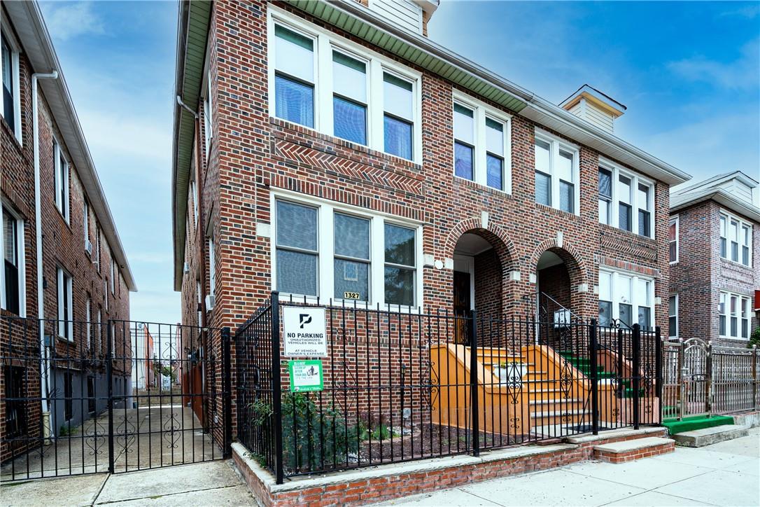 1327 Rosedale Avenue Bronx, NY 10472 - Photo 1 of 1 a view of brick building with many windows