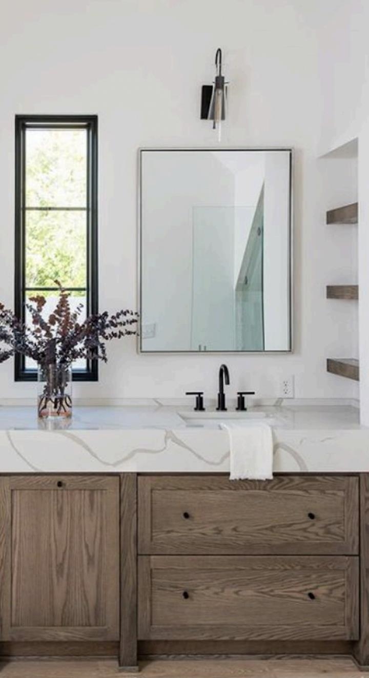 10633 Carson Range Road Truckee, CA 96161 - Photo 13 of 22 a bathroom with sink mirror and window