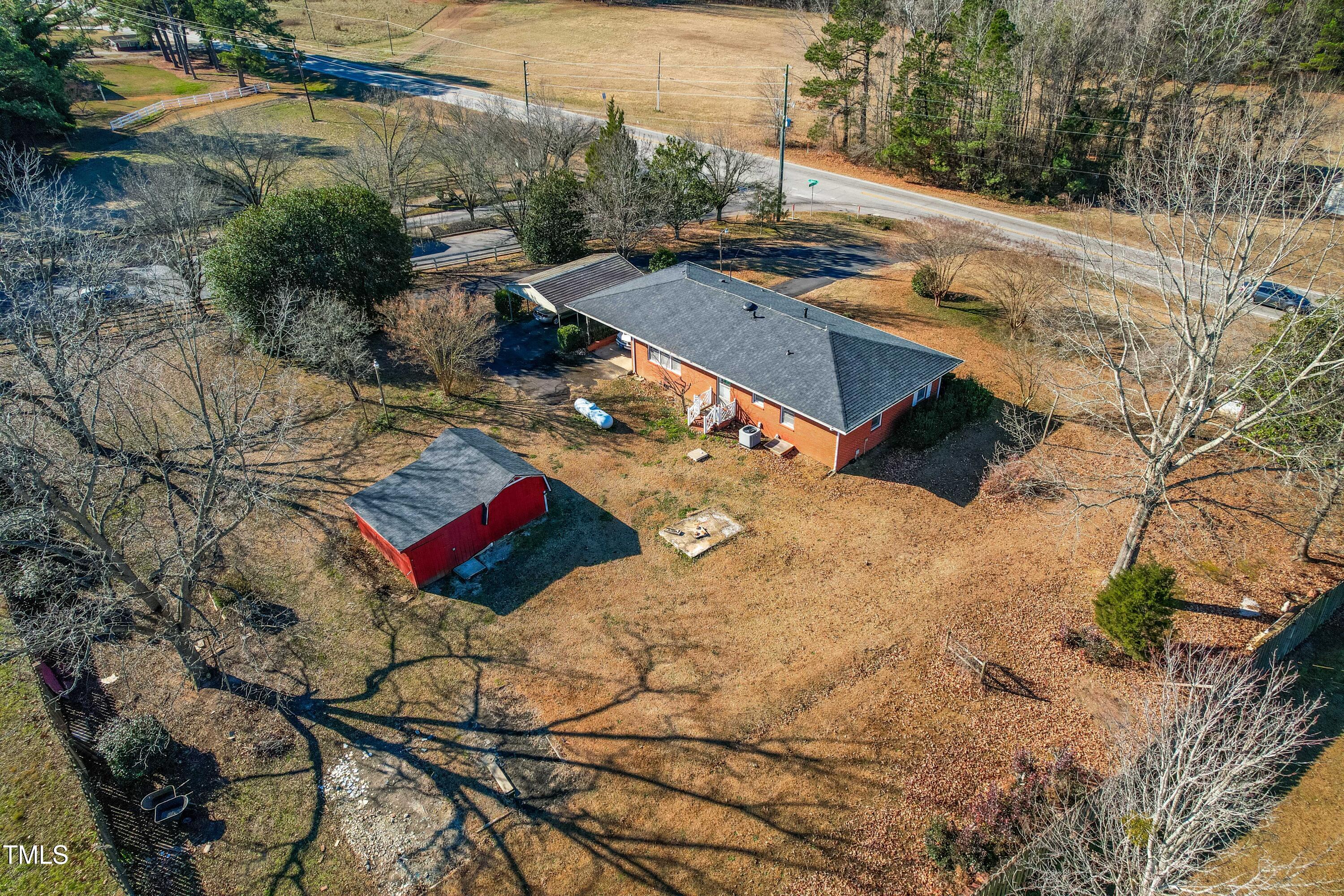 3001 Benson Road Garner, NC 27529 - Photo 8 of 13 a view of a backyard of a house