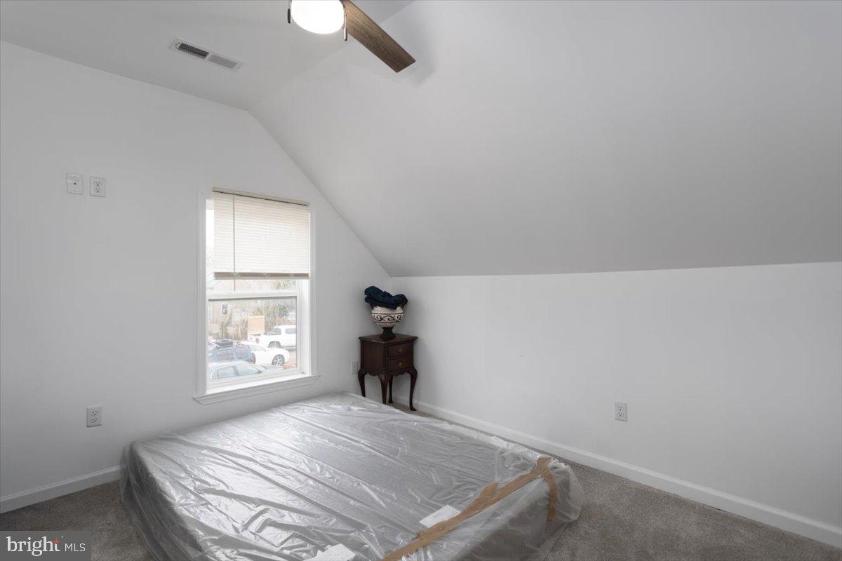 728 Race Street Cambridge, MD 21613 - Photo 12 of 14 an empty room with a window