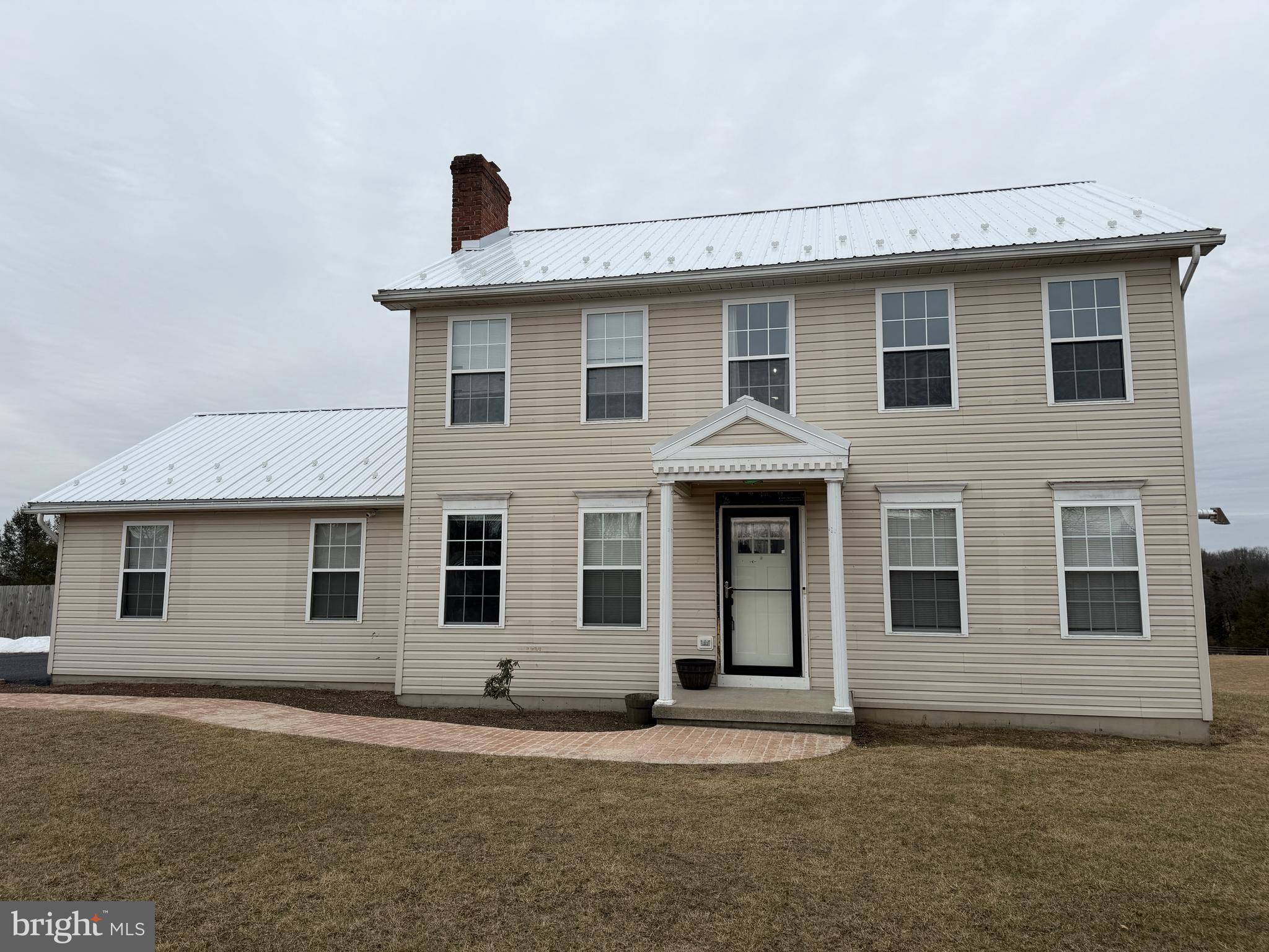 4 Subdivision Road Newville, PA 17241 - Photo 18 of 78 a front view of a house with a garden