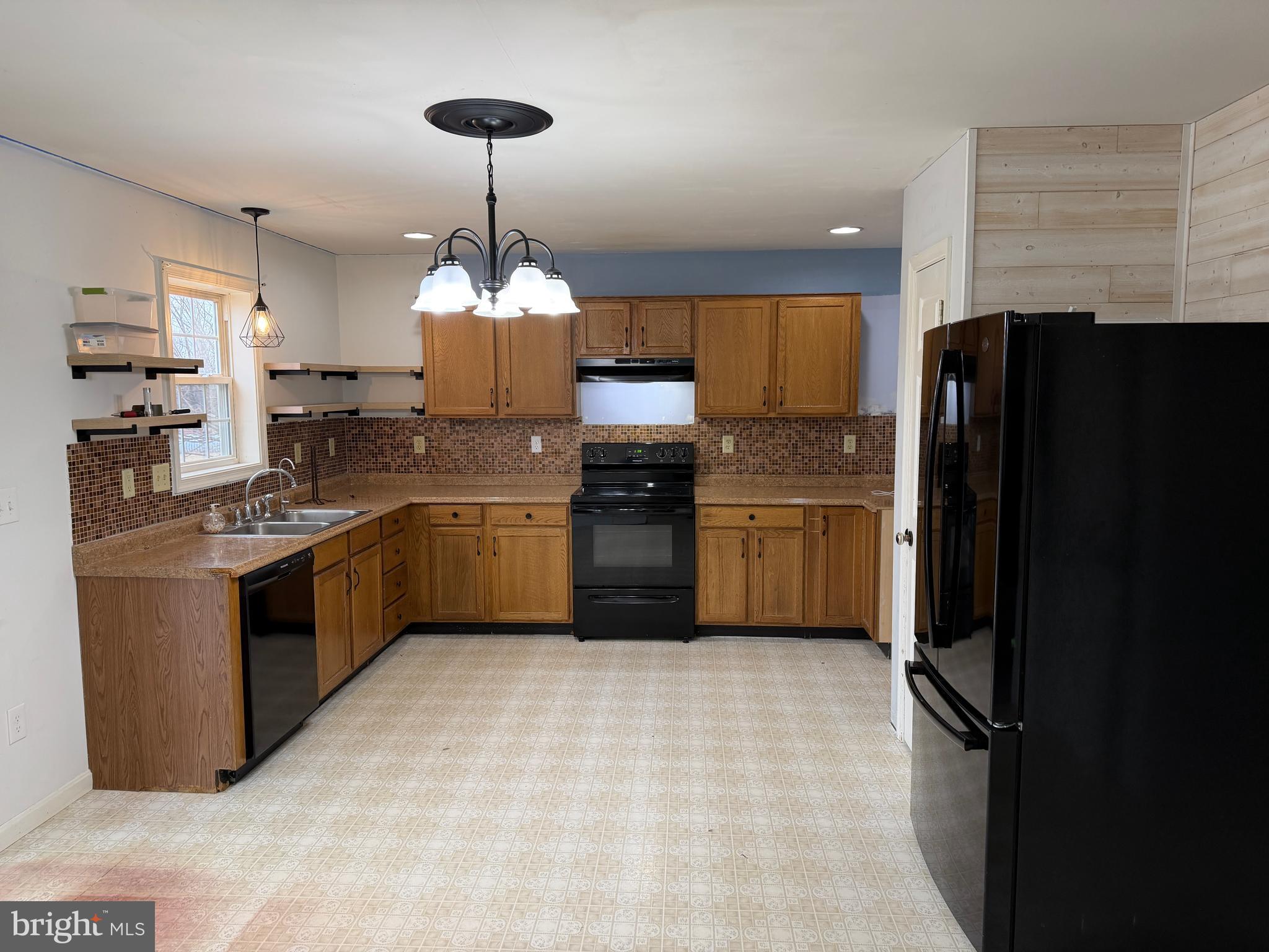 4 Subdivision Road Newville, PA 17241 - Photo 36 of 78 a kitchen with a sink cabinets and stainless steel appliances
