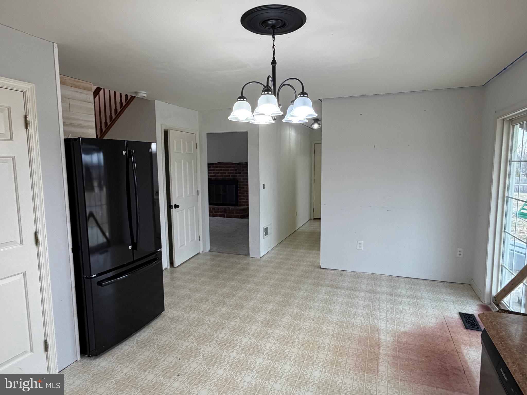 4 Subdivision Road Newville, PA 17241 - Photo 38 of 78 a view of a livingroom with a chandelier furniture and windows