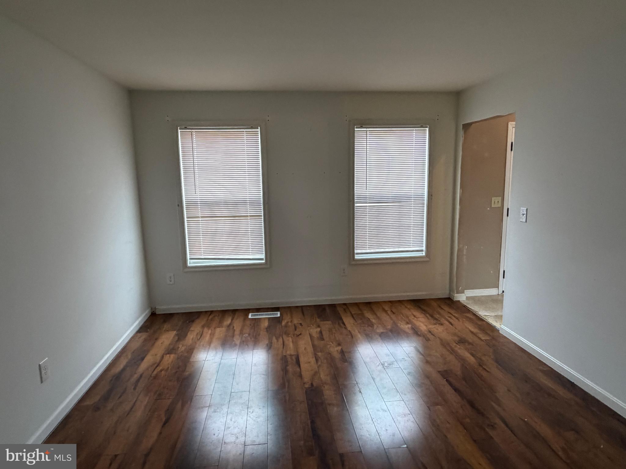 4 Subdivision Road Newville, PA 17241 - Photo 41 of 78 an empty room with wooden floor and windows