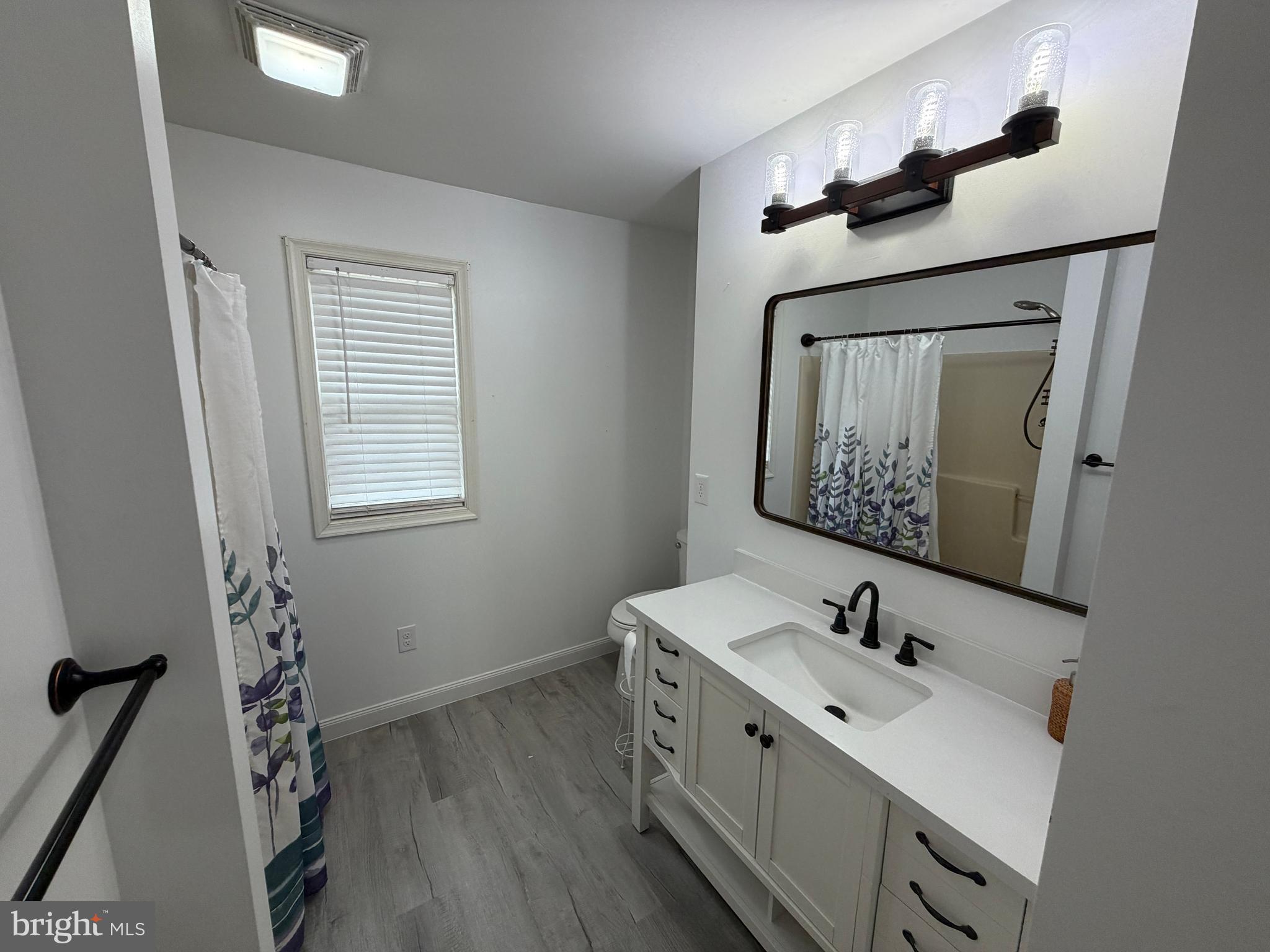 4 Subdivision Road Newville, PA 17241 - Photo 65 of 78 a bathroom with a sink mirror and vanity