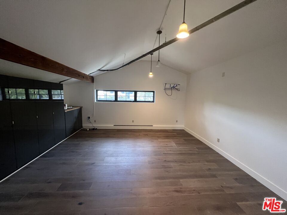 3360 Wrightview Place Studio City, CA 91604 - Photo 14 of 16 an empty room with wooden floor and windows