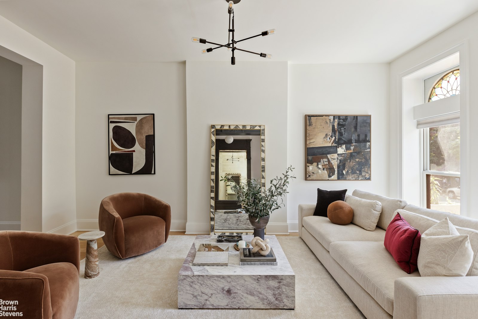 a living room with furniture or couch and a window