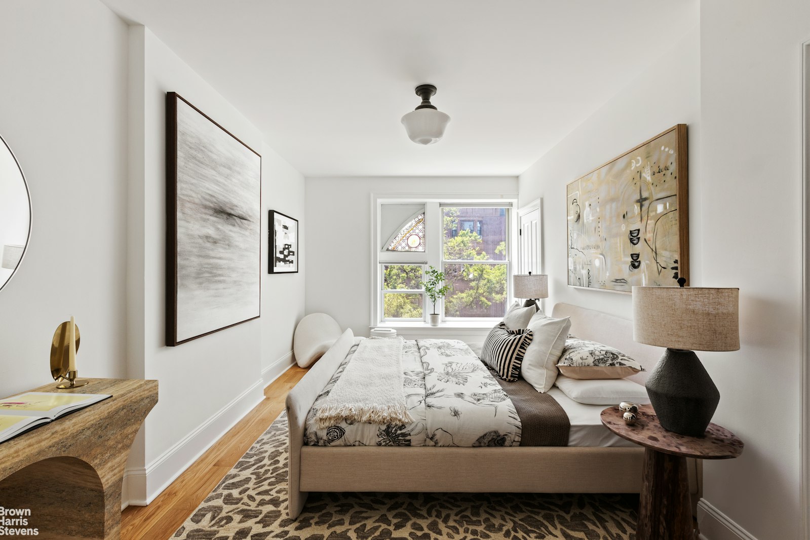 271 Decatur Street Brooklyn, NY 11233 - Photo 10 of 15 a bed sitting in a bedroom next to a window