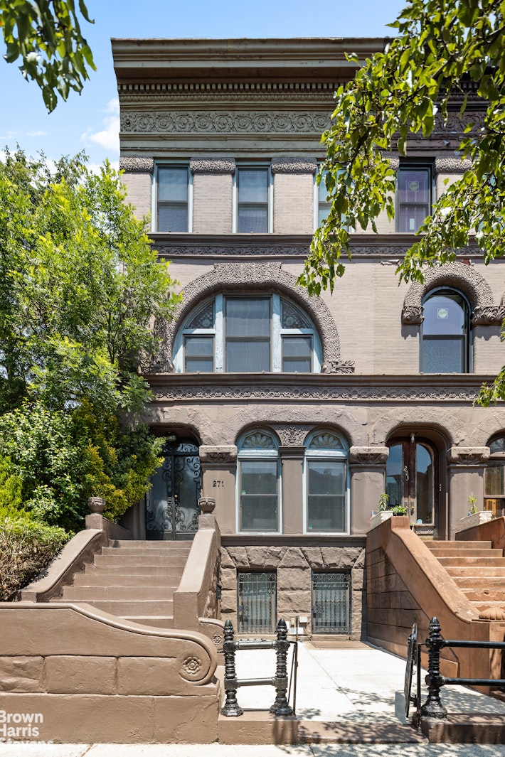 271 Decatur Street Brooklyn, NY 11233 - Photo 8 of 15 a building with trees in front of it
