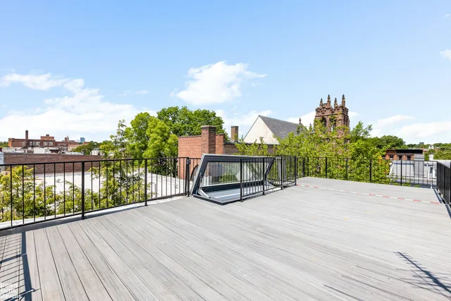 a building with trees in front of it