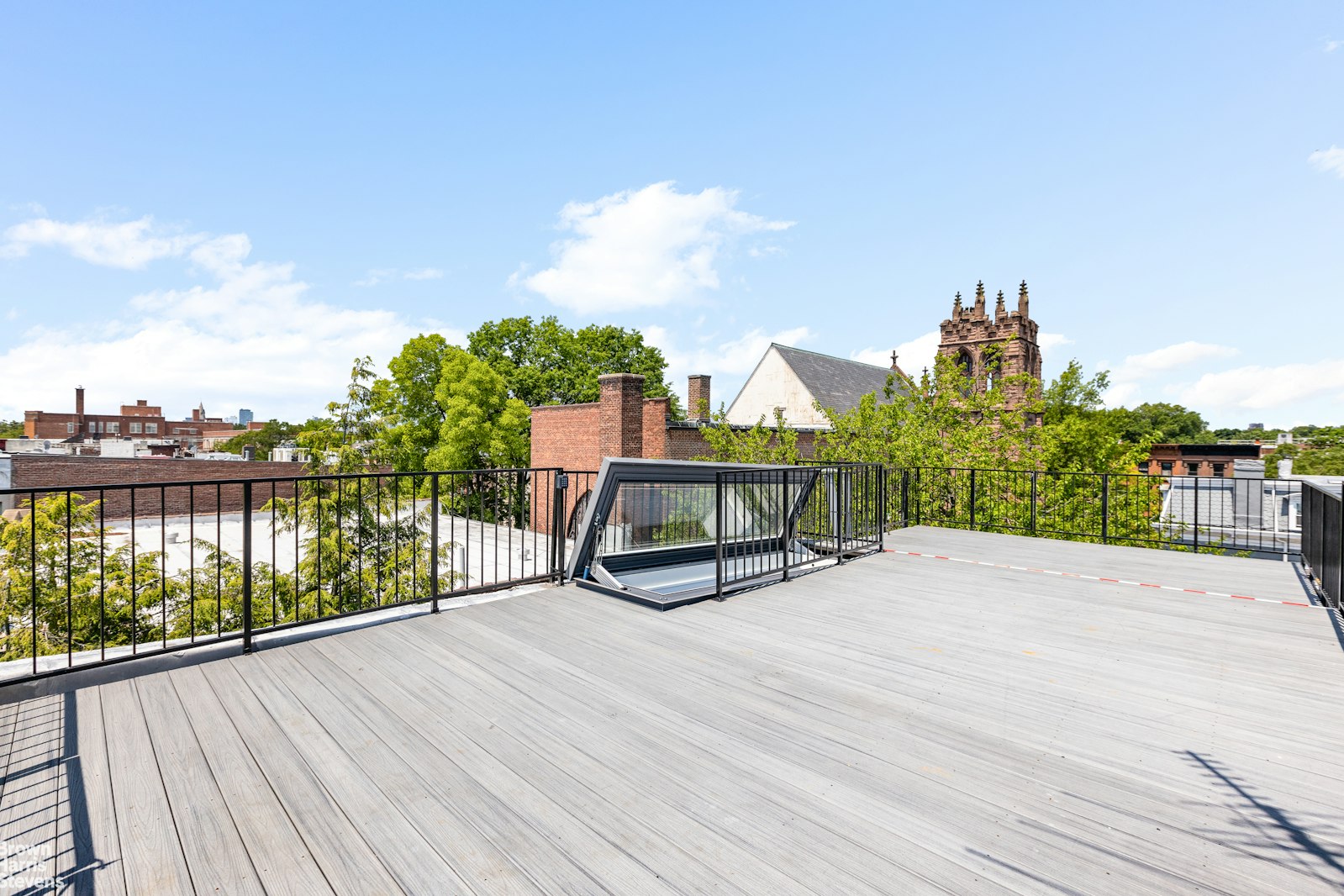 271 Decatur Street Brooklyn, NY 11233 - Photo 9 of 15 a view of a house with roof deck