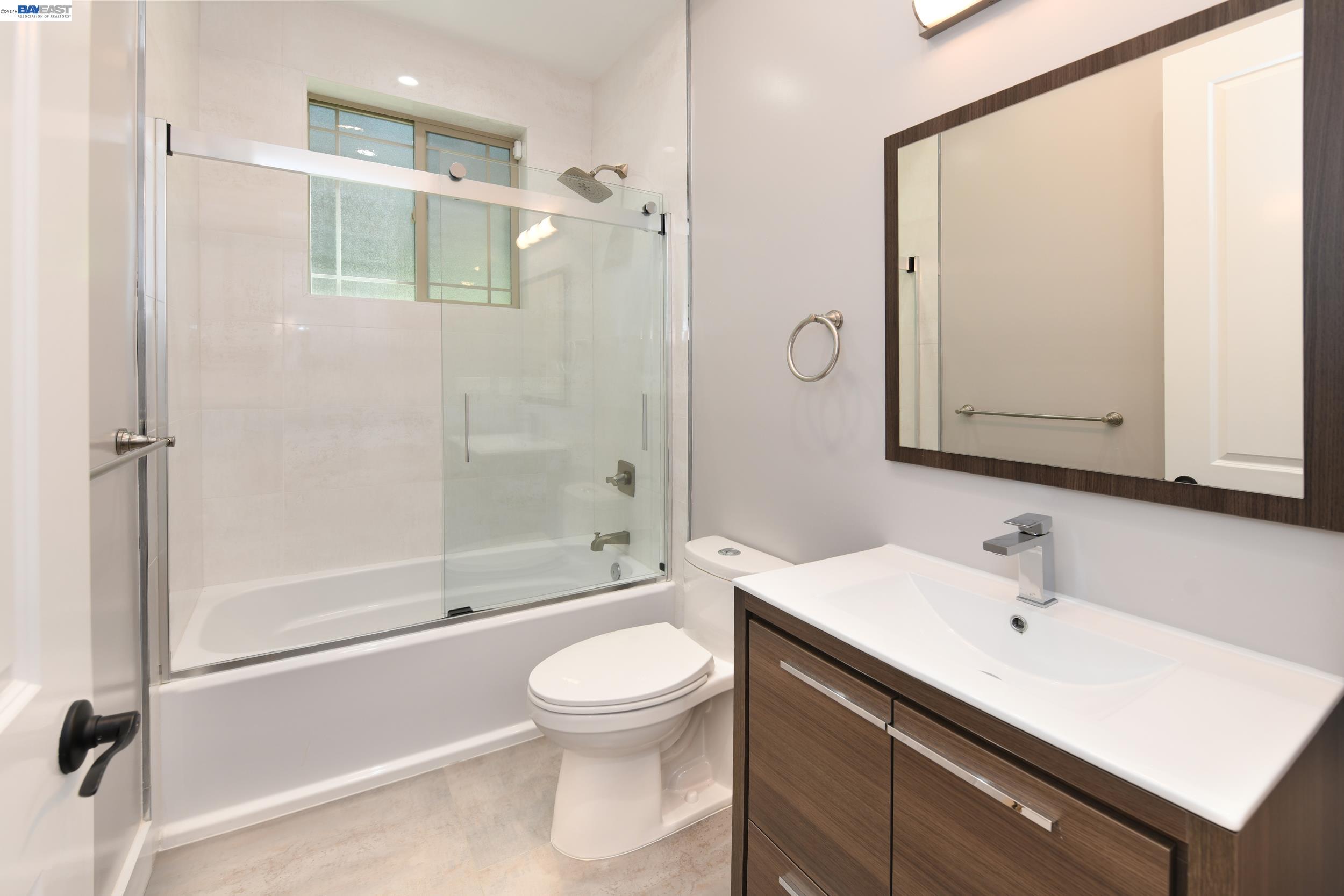 1516 Pleasant Hill Road Lafayette, CA 94549 - Photo 17 of 38 a bathroom with a sink a toilet and shower