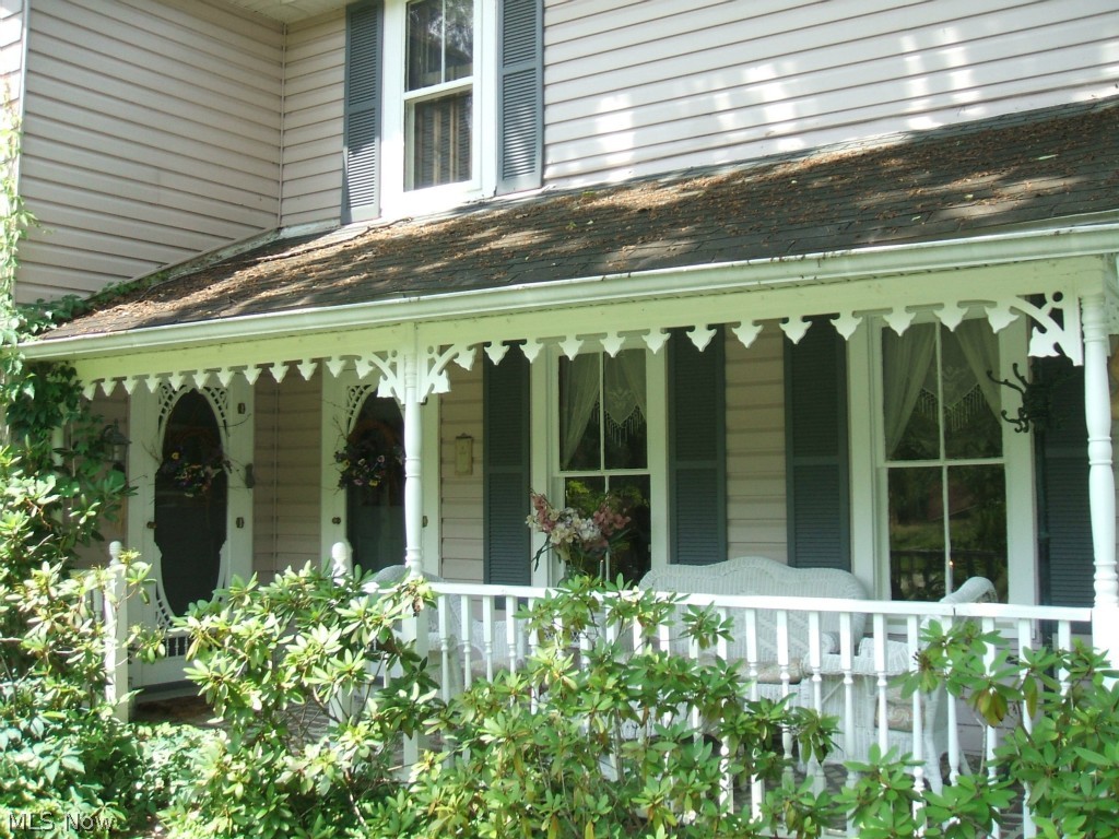 2118 North Medina Line Road Akron, OH 44333 - Photo 5 of 25 View of front porch. Double entry into kitchen and family room