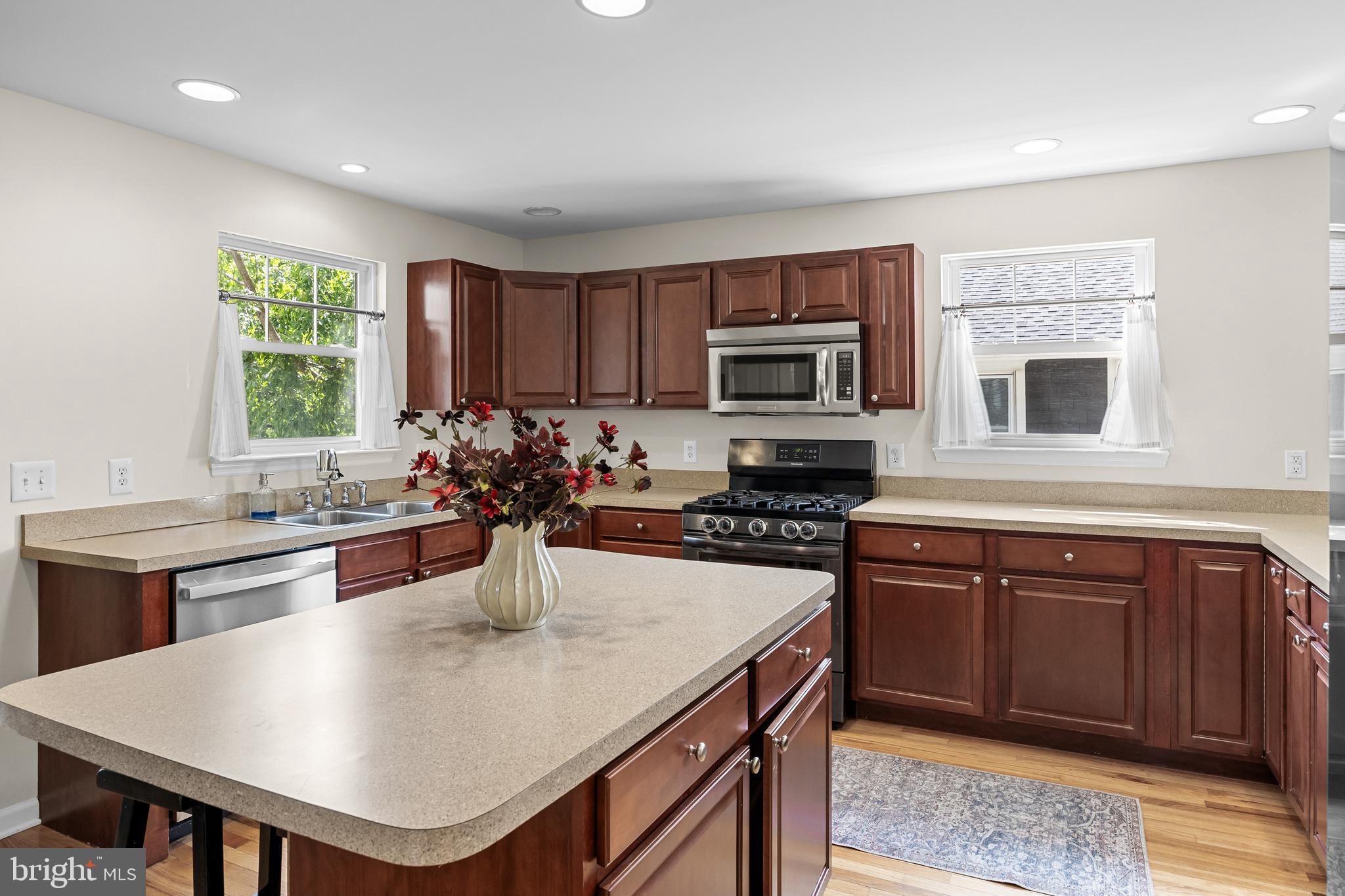 188 Carlisle Road Audubon, NJ 08106 - Photo 16 of 40 a kitchen with sink cabinets and window