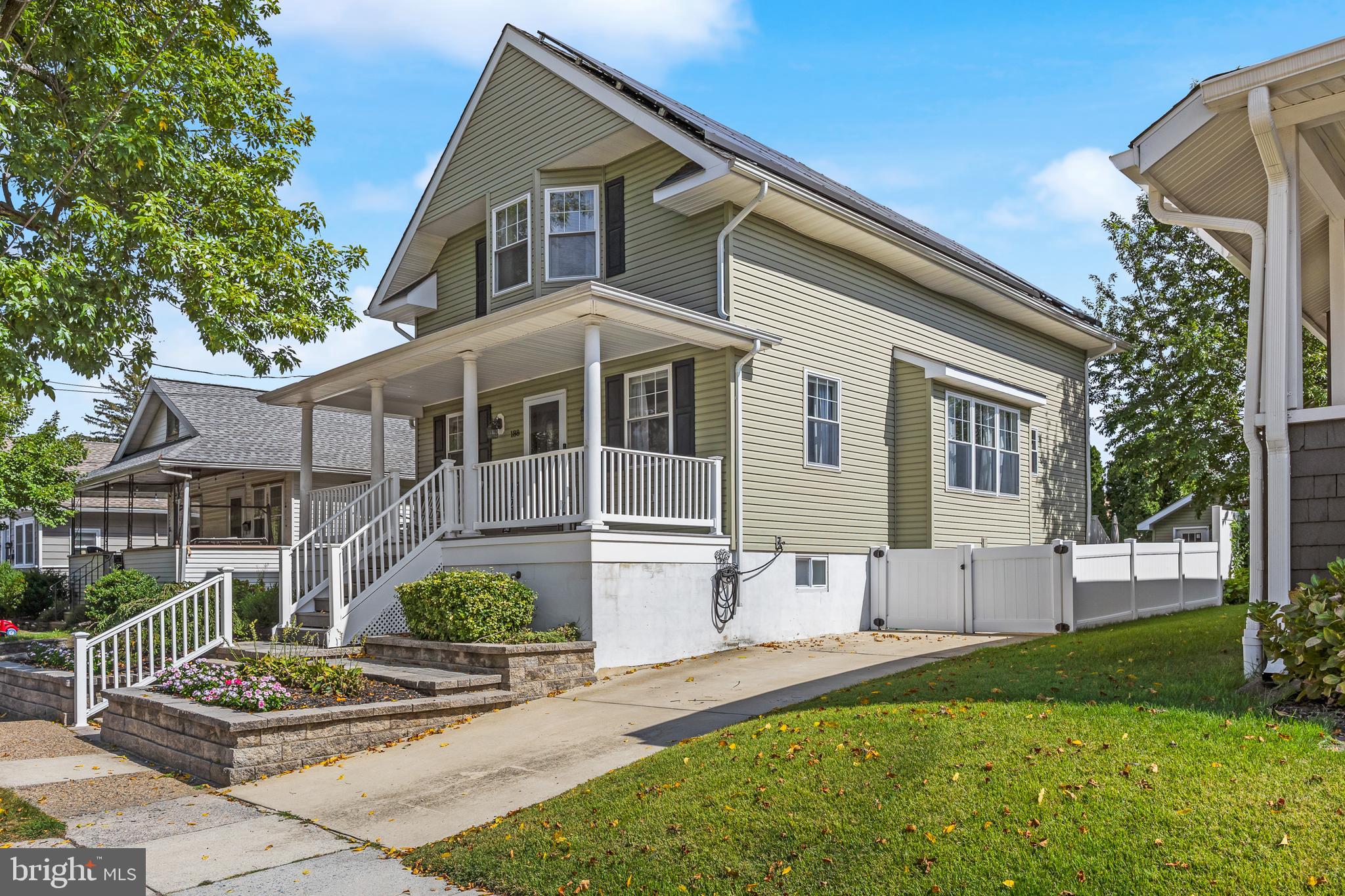 188 Carlisle Road Audubon, NJ 08106 - Photo 2 of 40 a front view of a house with a garden and plants