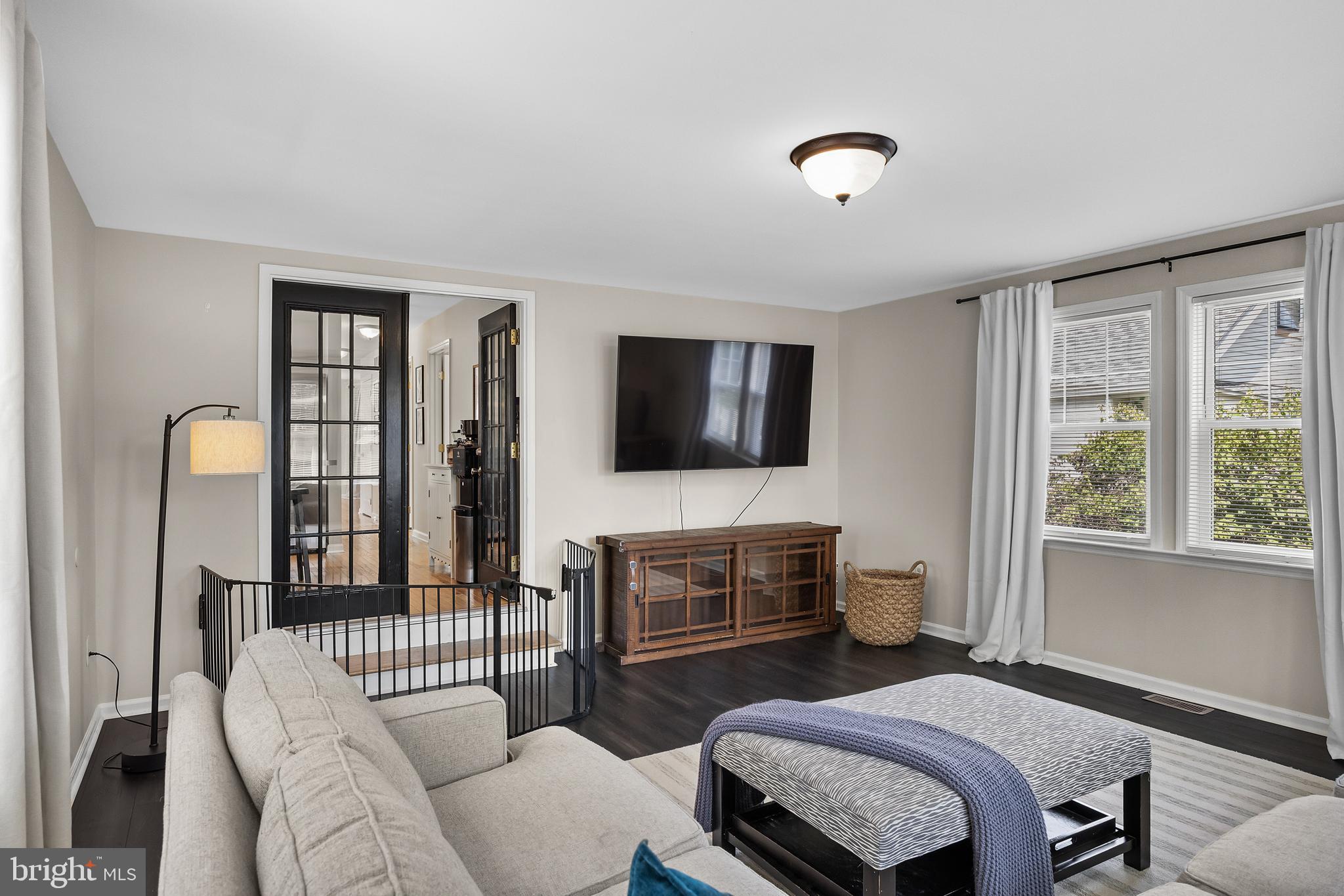 188 Carlisle Road Audubon, NJ 08106 - Photo 21 of 40 a bedroom with furniture a flat screen tv and a fireplace