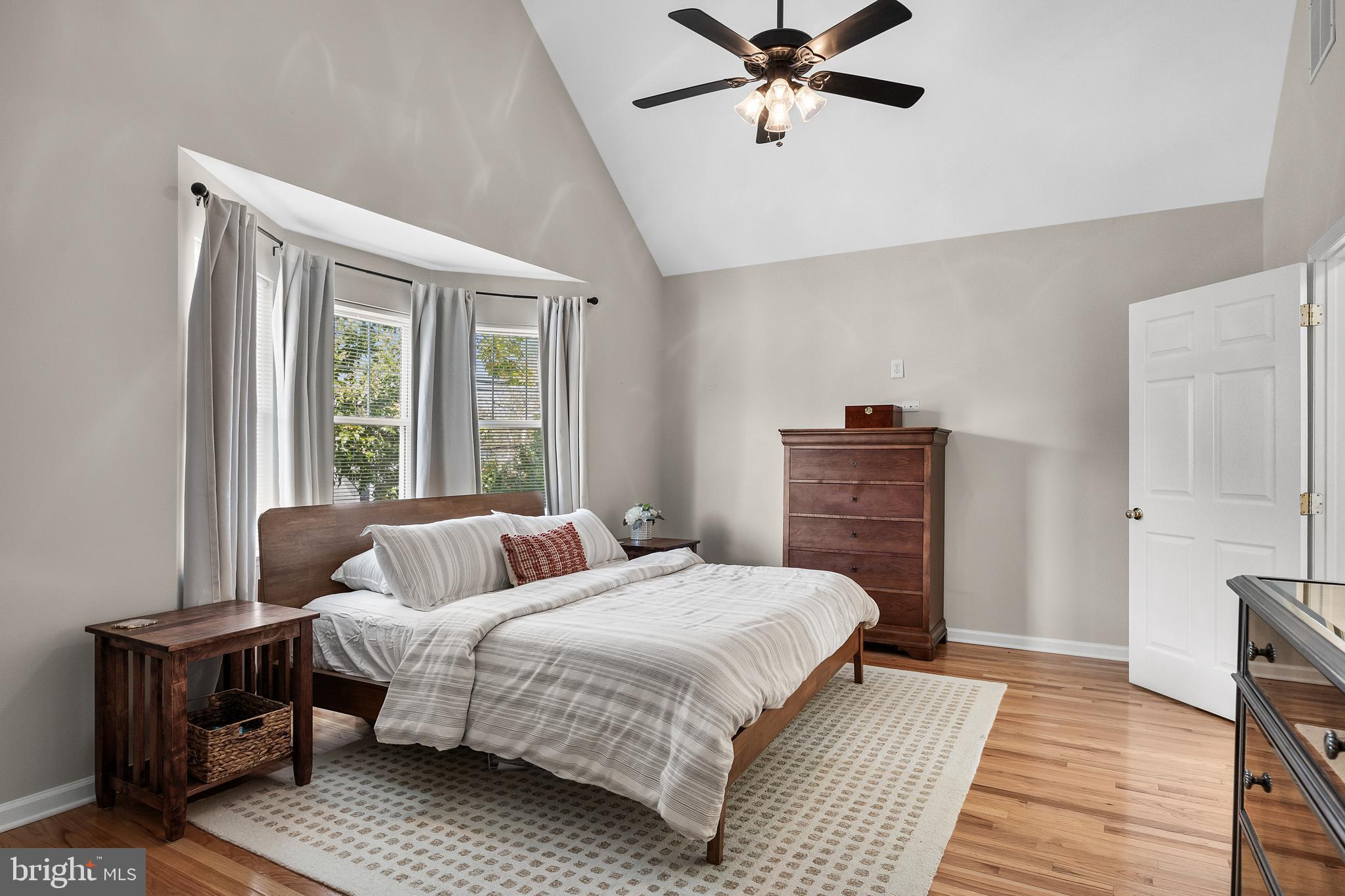 188 Carlisle Road Audubon, NJ 08106 - Photo 28 of 40 a bedroom with a bed and wooden floor