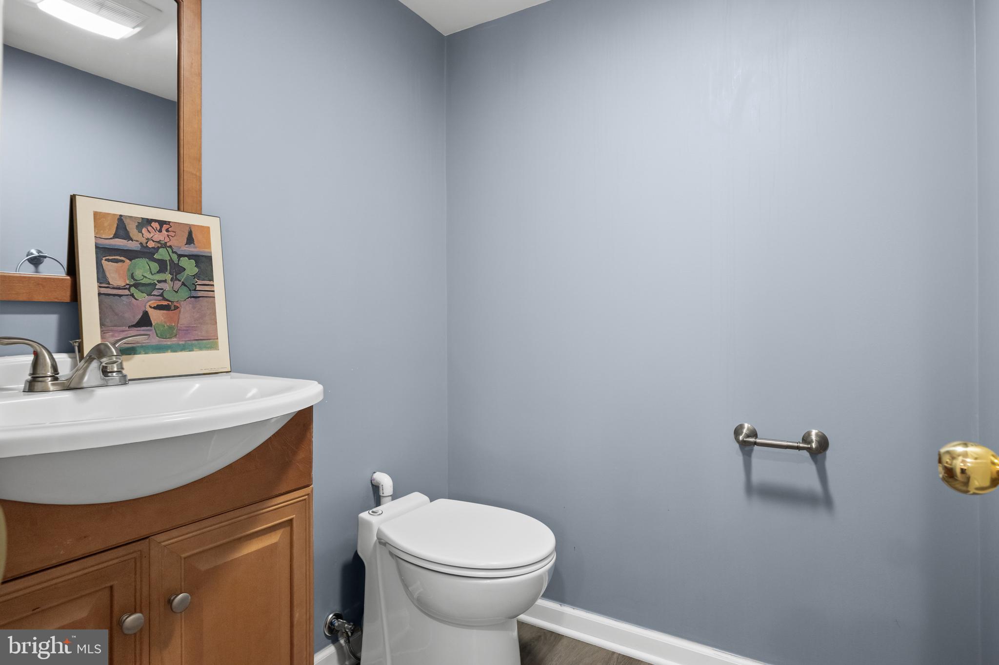 188 Carlisle Road Audubon, NJ 08106 - Photo 35 of 40 a bathroom with a sink a toilet and mirror