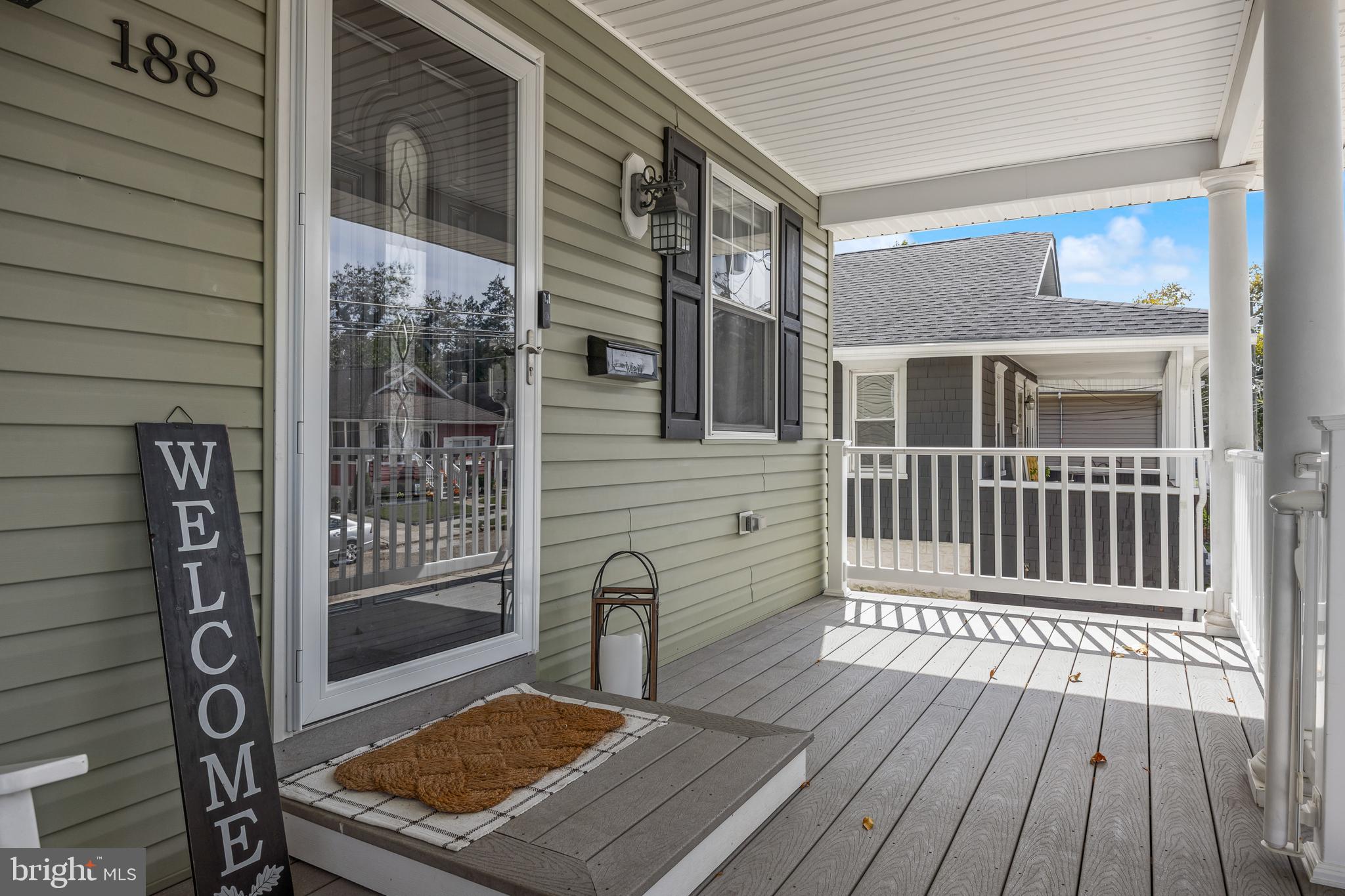 188 Carlisle Road Audubon, NJ 08106 - Photo 4 of 40 a view of a wooden deck with a chair