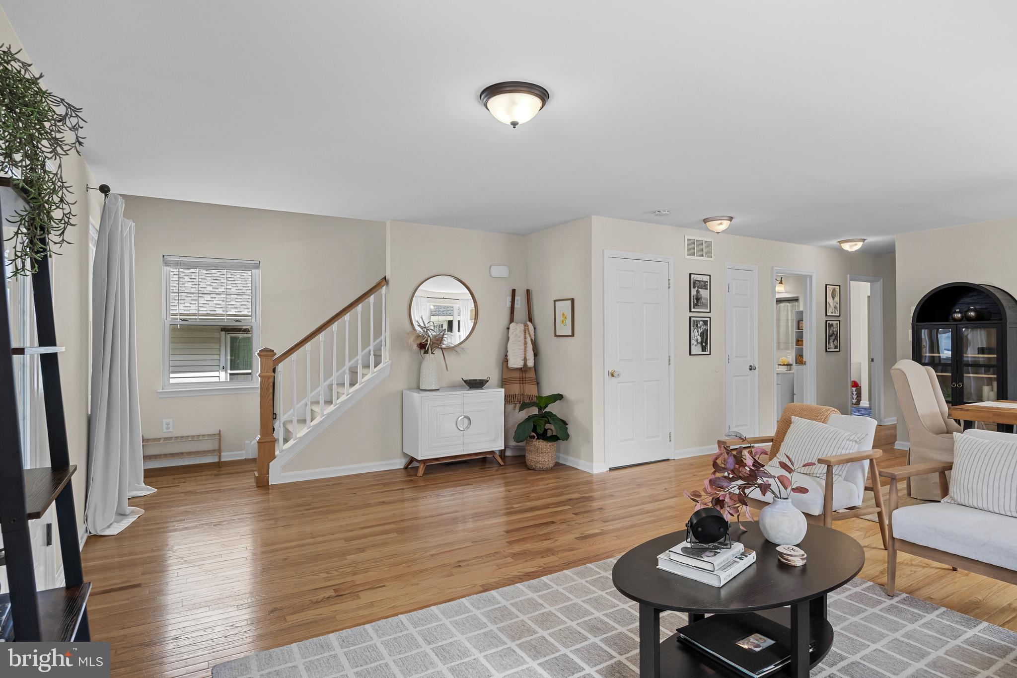 188 Carlisle Road Audubon, NJ 08106 - Photo 9 of 40 a living room with furniture and a wooden floor