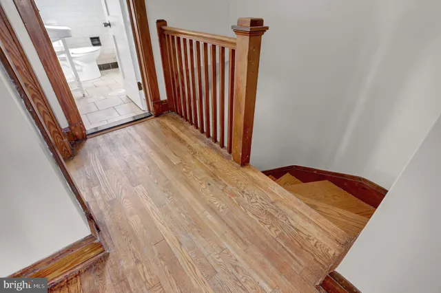 a view of a hallway view with staircase