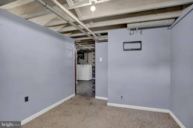 a view of storage and utility room