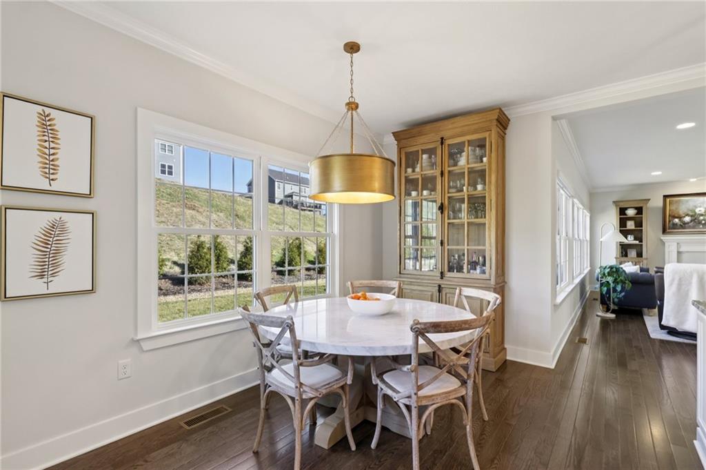 216 Hickory Lane Mars, PA 16046 - Photo 13 of 50 a view of a dining room with furniture window and wooden floor