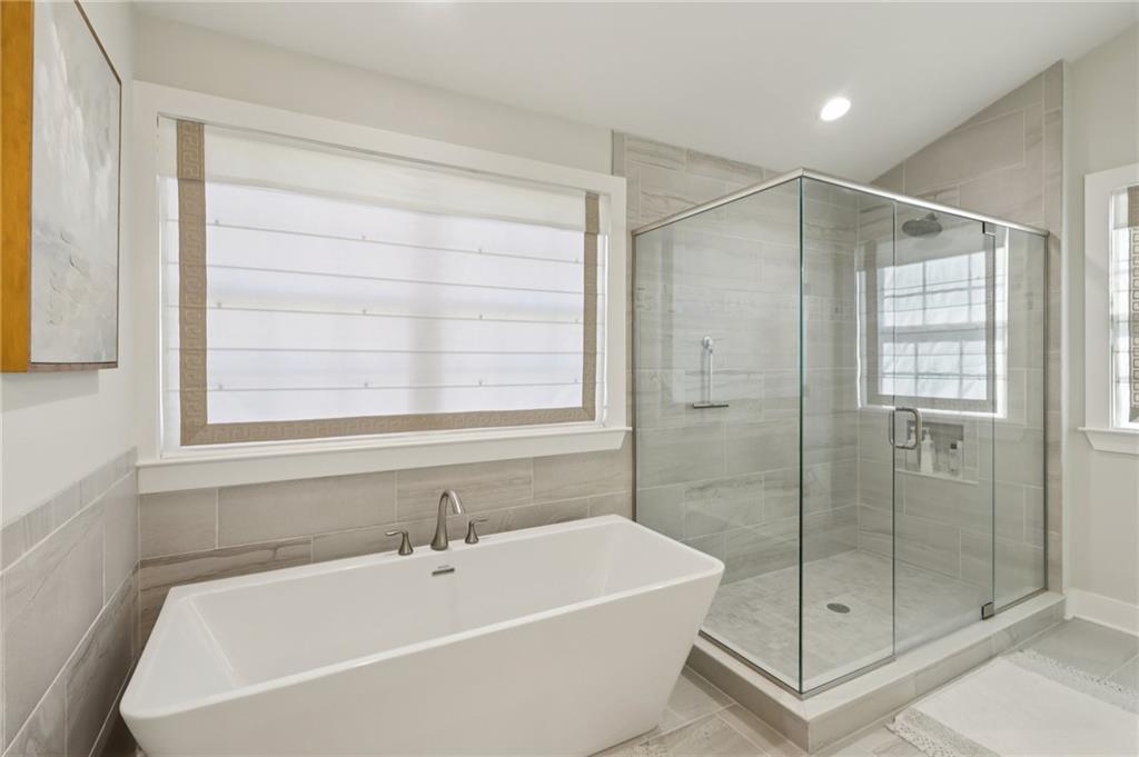 216 Hickory Lane Mars, PA 16046 - Photo 26 of 50 a white bath tub sitting next to a window