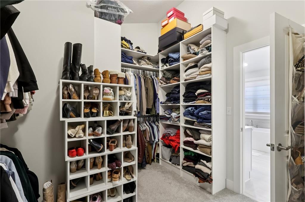 216 Hickory Lane Mars, PA 16046 - Photo 28 of 50 a view of walk in closet with clothes and shoes