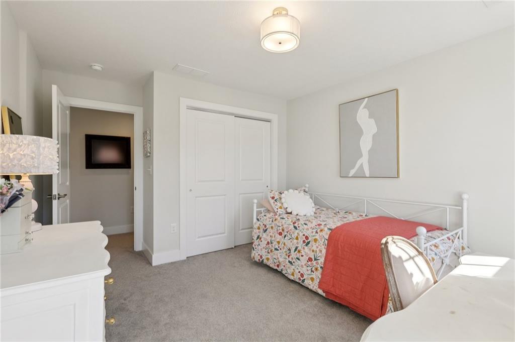 216 Hickory Lane Mars, PA 16046 - Photo 35 of 50 a bedroom with a bed and a television