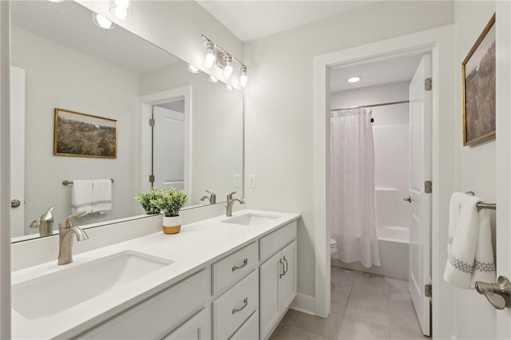 216 Hickory Lane Mars, PA 16046 - Photo 36 of 50 a bathroom with double vanity sink a vanity and a mirror