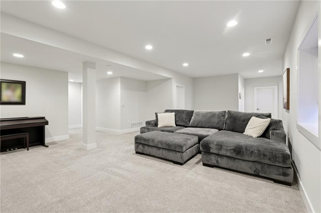 216 Hickory Lane Mars, PA 16046 - Photo 39 of 50 a living room with furniture and a piano