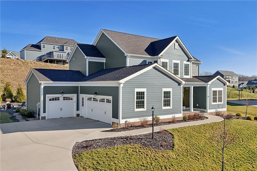 216 Hickory Lane Mars, PA 16046 - Photo 48 of 50 a front view of a house with a yard