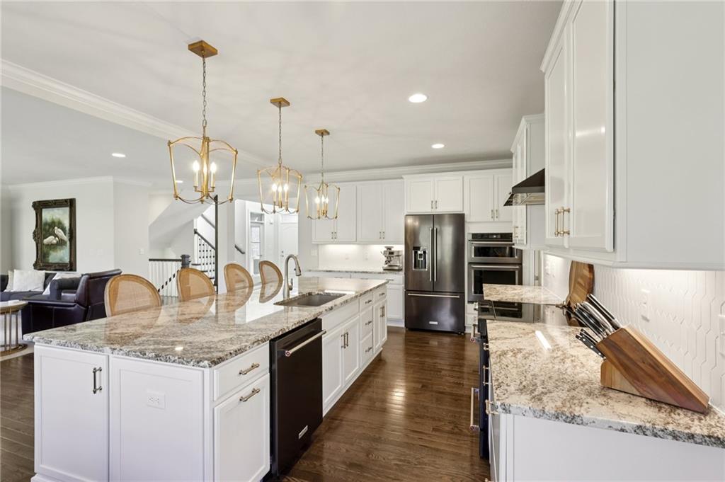 216 Hickory Lane Mars, PA 16046 - Photo 10 of 50 a kitchen with stainless steel appliances granite countertop a sink stove and refrigerator