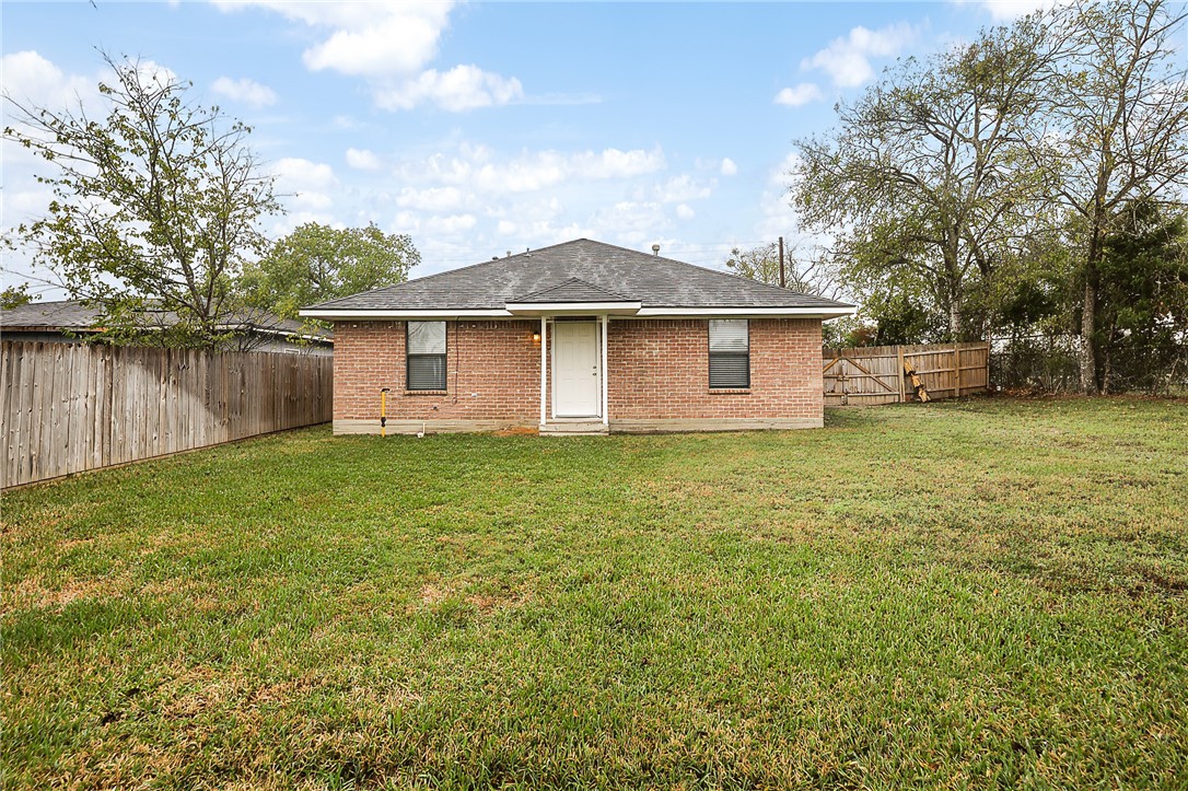 314 Moss Street Bryan, TX 77803 - Photo 16 of 18 a front view of house with yard and lake view
