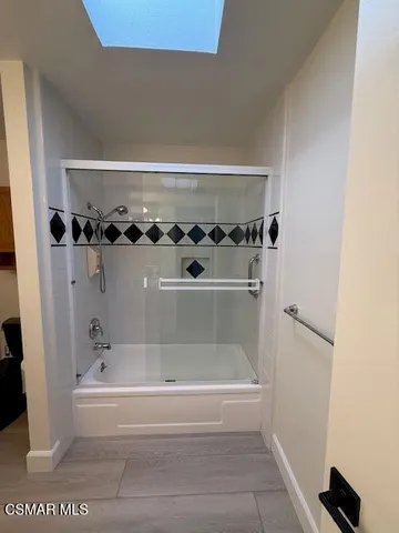 a bathroom with a bathtub
