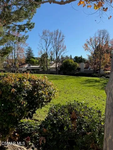 a view of a lake with houses