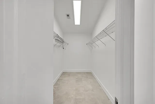 a view of a room with racks on the wall