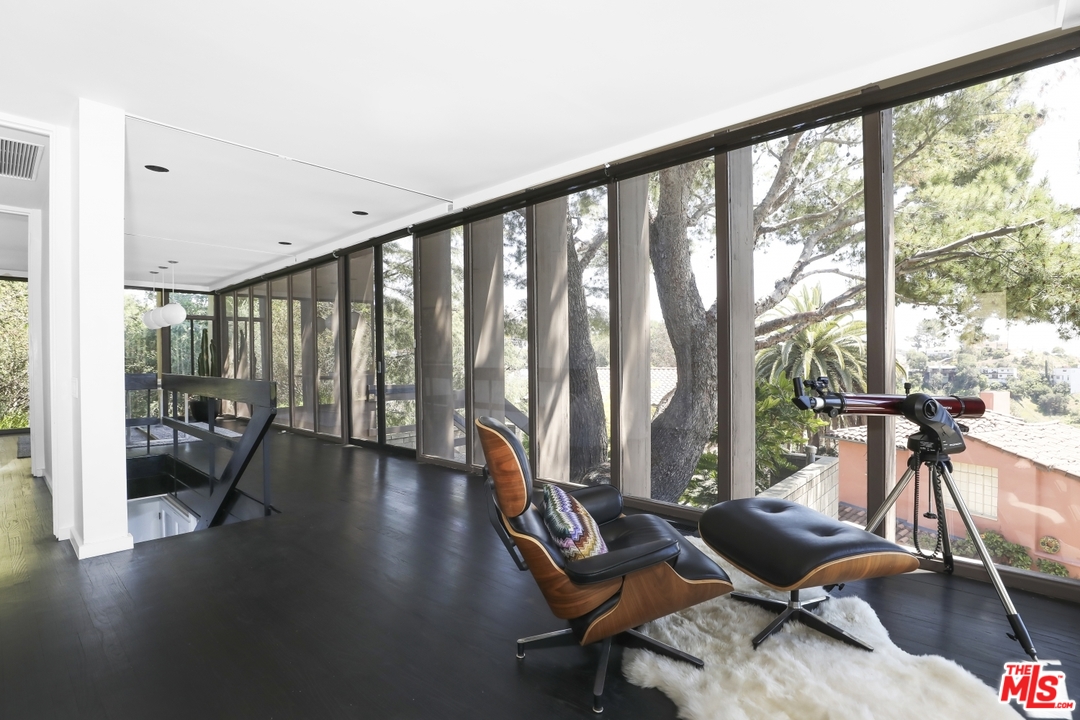 2867 Belden Drive Los Angeles, CA 90068 - Photo 11 of 54 a living room with furniture and floor to ceiling windows