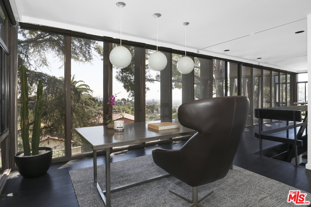 2867 Belden Drive Los Angeles, CA 90068 - Photo 14 of 54 a living room with furniture and a floor to ceiling window