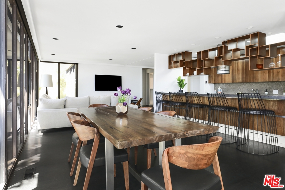 2867 Belden Drive Los Angeles, CA 90068 - Photo 18 of 54 a view of a dining room with furniture and a potted plant