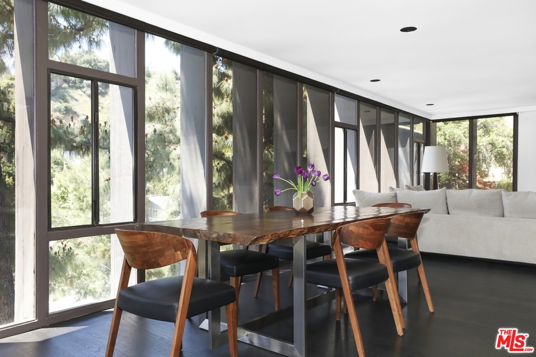 2867 Belden Drive Los Angeles, CA 90068 - Photo 19 of 54 a view of a dining room with furniture window and wooden floor