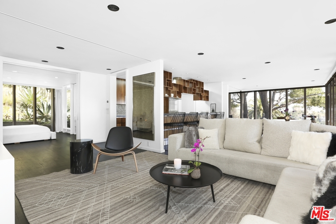 2867 Belden Drive Los Angeles, CA 90068 - Photo 21 of 54 a living room with furniture and a wooden floor
