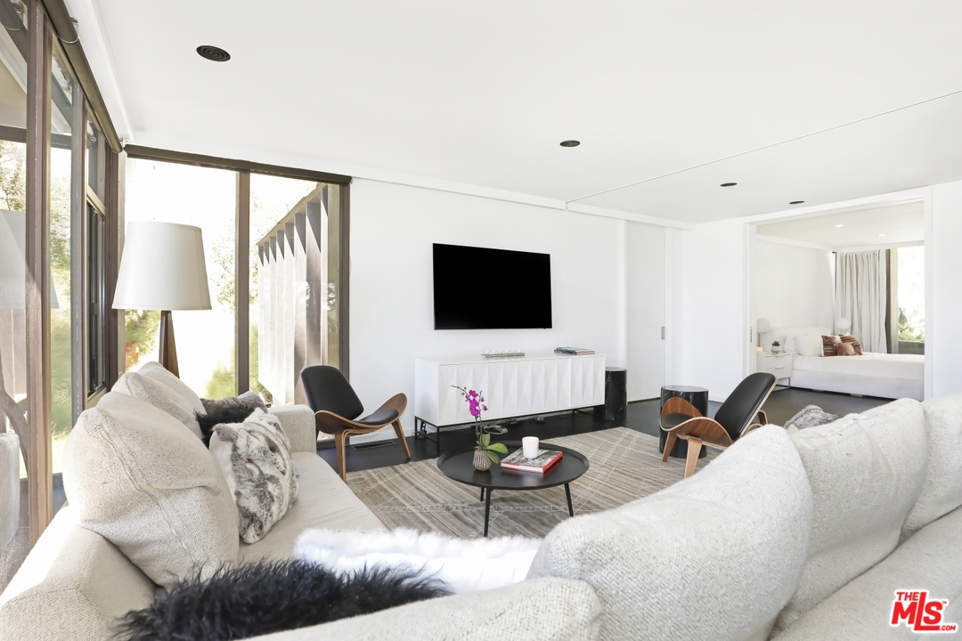 2867 Belden Drive Los Angeles, CA 90068 - Photo 22 of 54 a living room with furniture and a flat screen tv